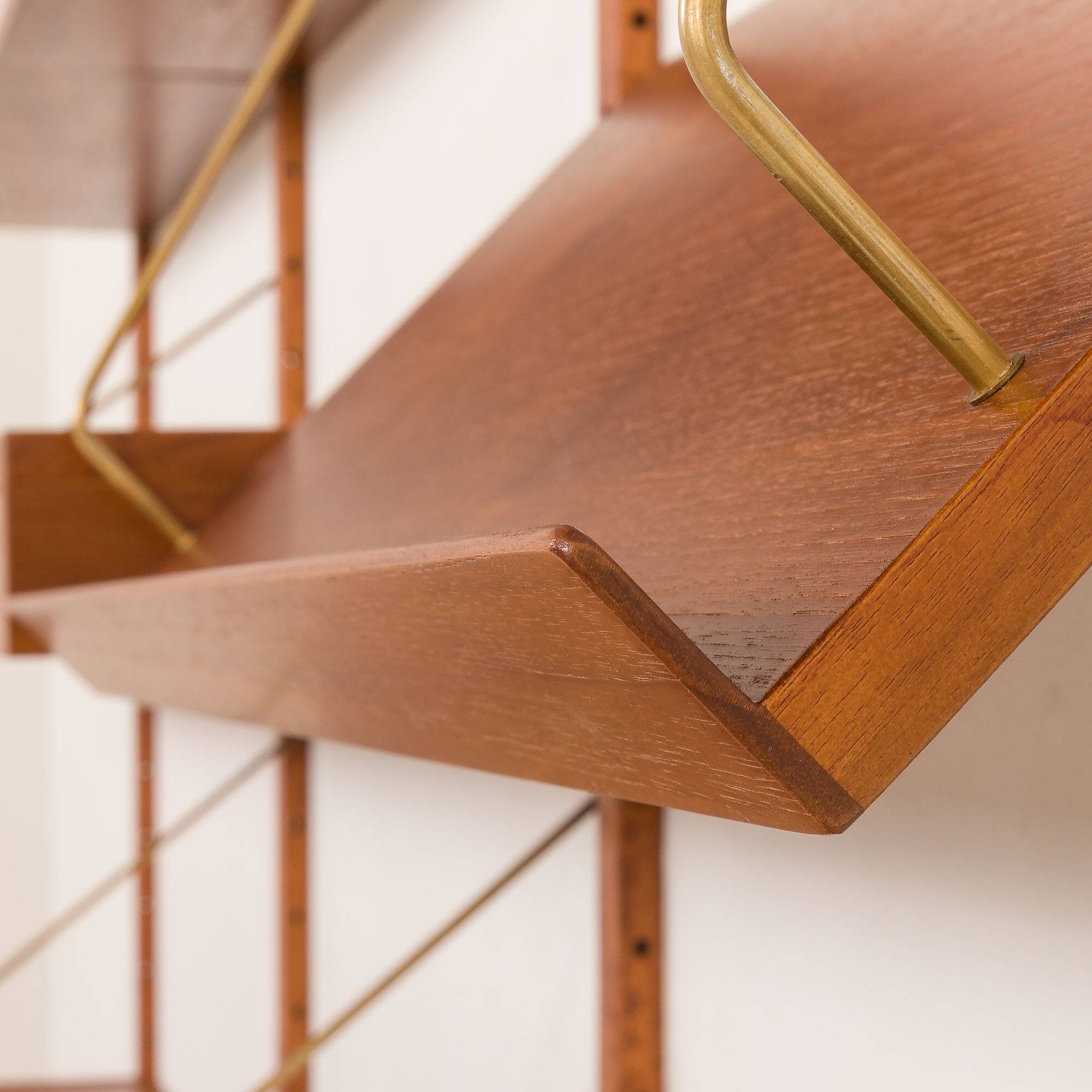 Danish teak wall unit in the style of Cadovius, Sorensen with a lamp, 1970s