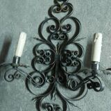 Two large wrought iron wall lights