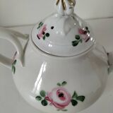 Porcelain teapot with rose patterns