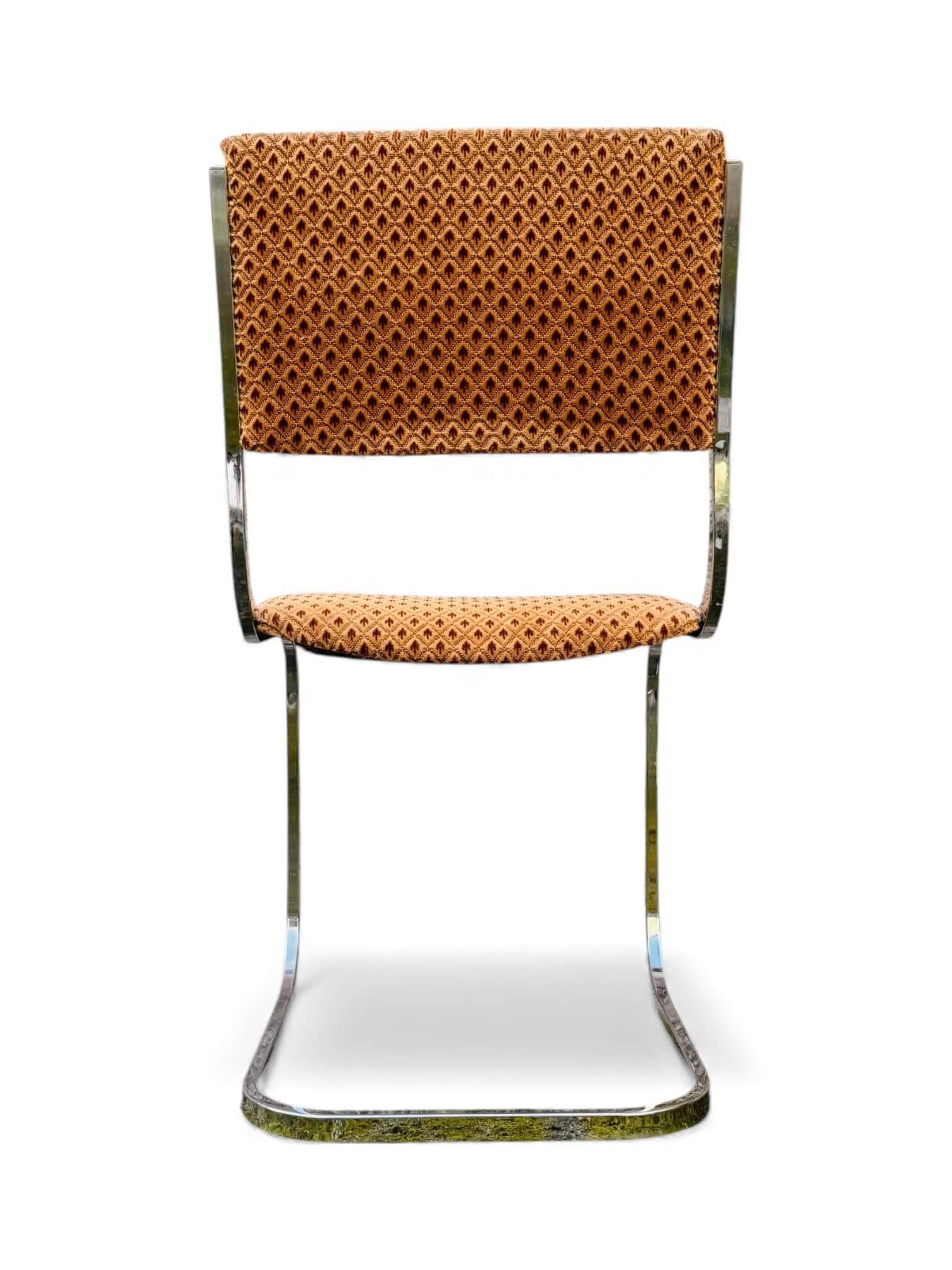 Set of 4 vintage sled chairs from the 1970s