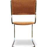 Set of 4 vintage sled chairs from the 1970s