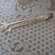Silver-plated crow's feet claw