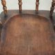Wooden English antique pub/captain chair from the late 19th century