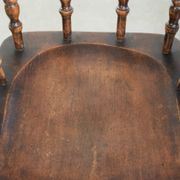 Wooden English antique pub/captain chair from the late 19th century