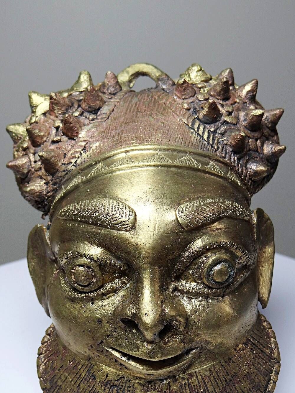 Small gilded bronze Oba mask from Bamoun, Cameroon, vintage Africa