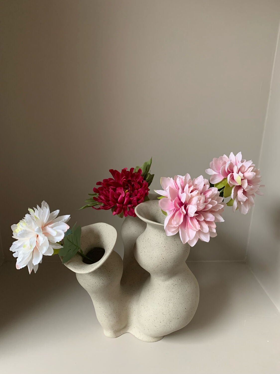 Organic-shaped vase in pyritic stoneware.