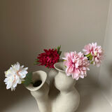 Organic-shaped vase in pyritic stoneware.
