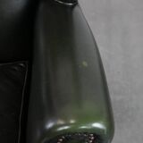 Smooth classic cowhide Chesterfield armchair in a stylish dark green color