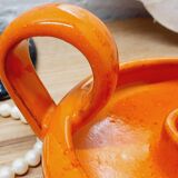 Orange cellar rat candle holder