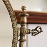 Oval mirror on psyche stand