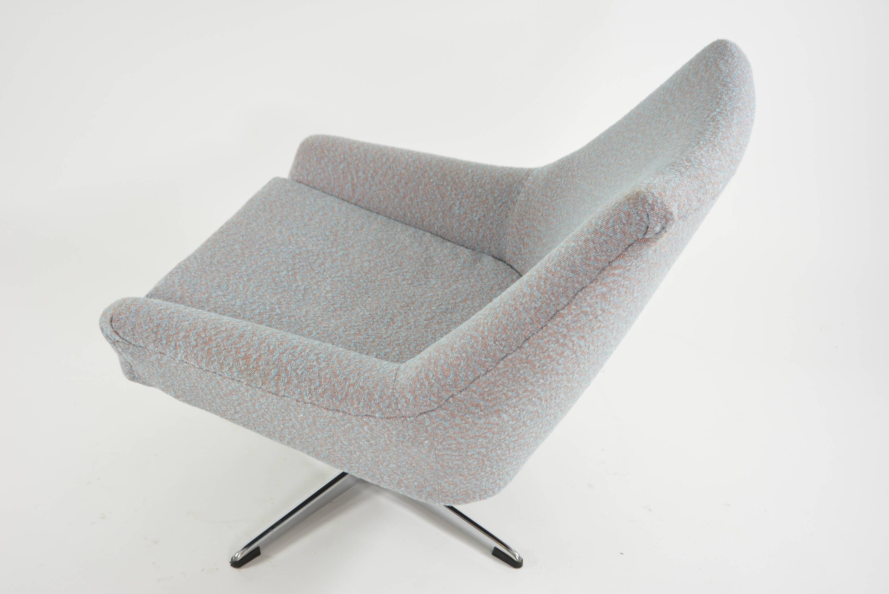 Modernist shell armchairs from the 1970s.