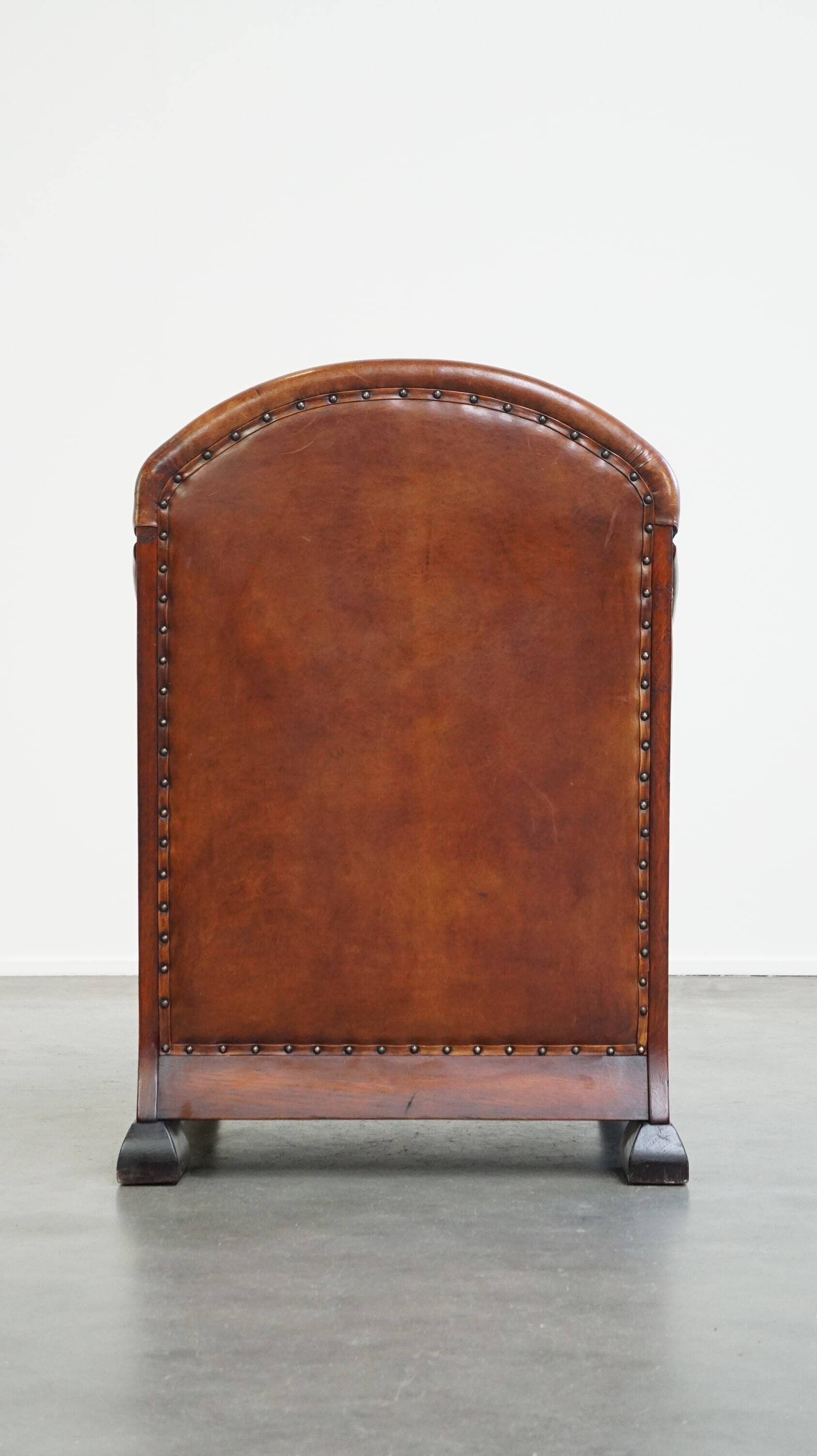 Unique, stately, comfortable sheepskin Art Deco design armchair