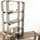 Stainless steel and smoked glass shelves by Donald Singer