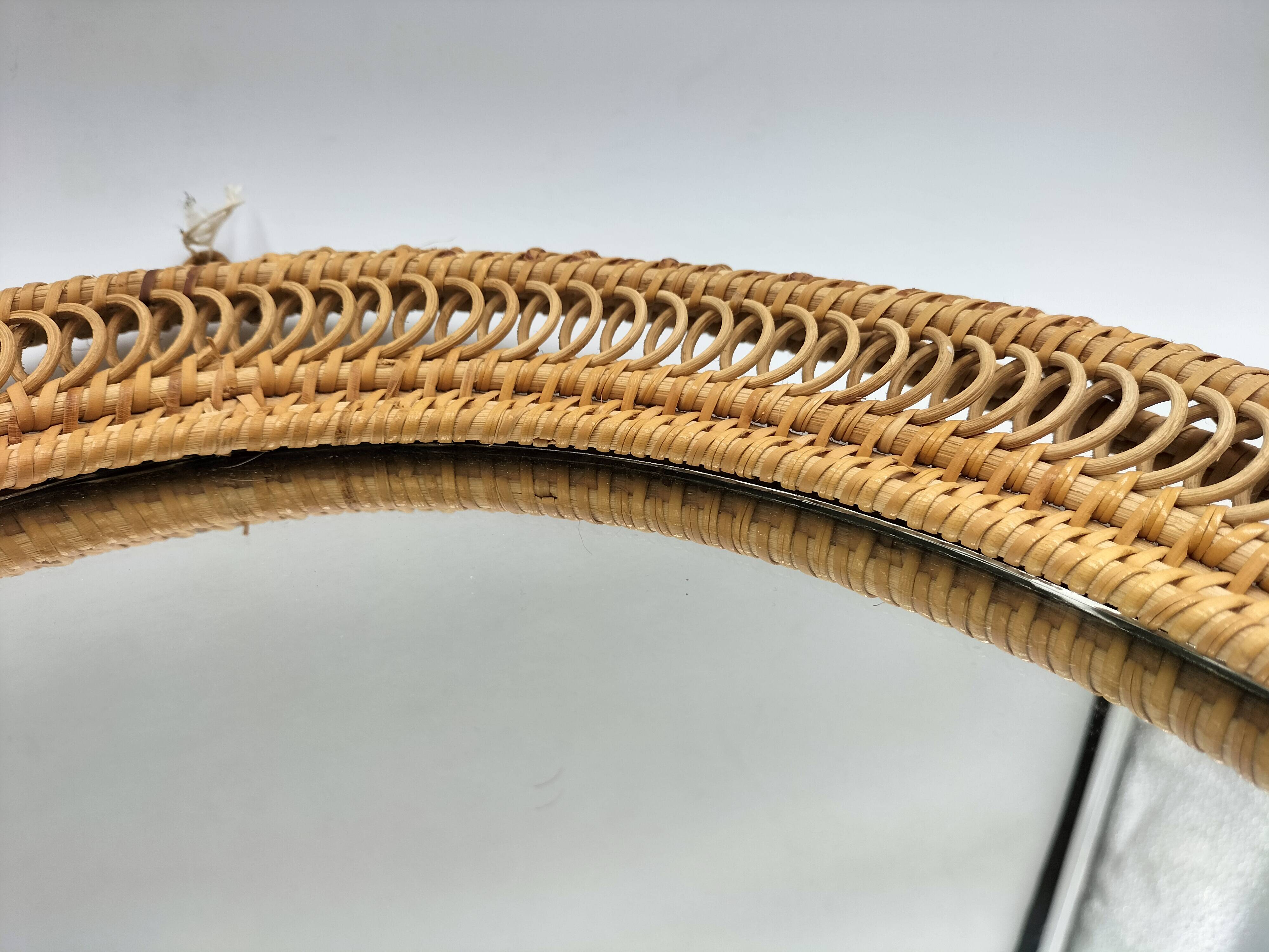 Oval rattan mirror