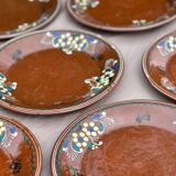Set of old enamelled terracotta plates