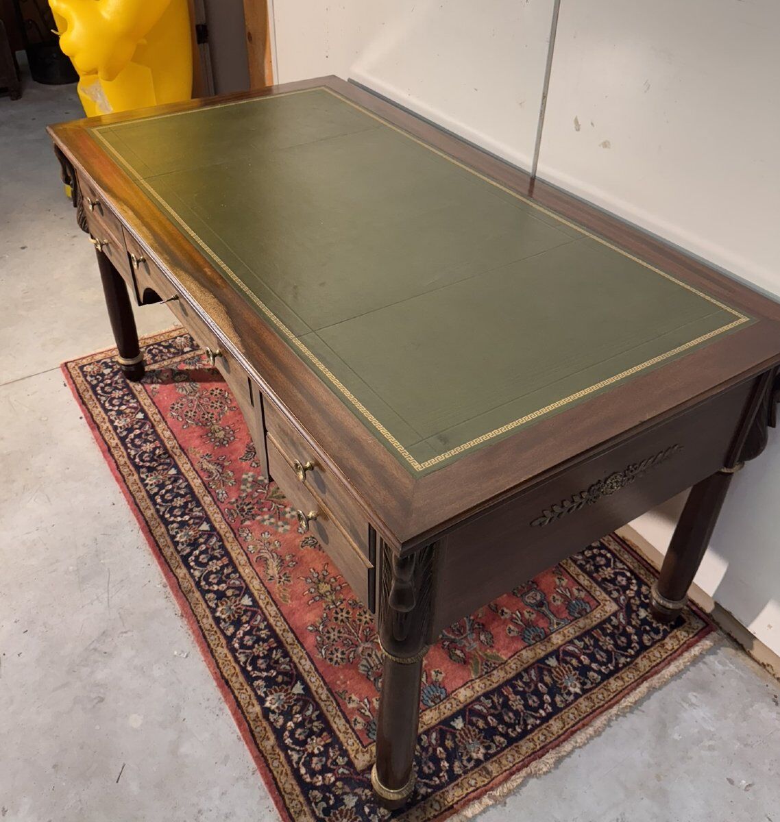 Empire-style minister's desk with swan necks in mahogany.