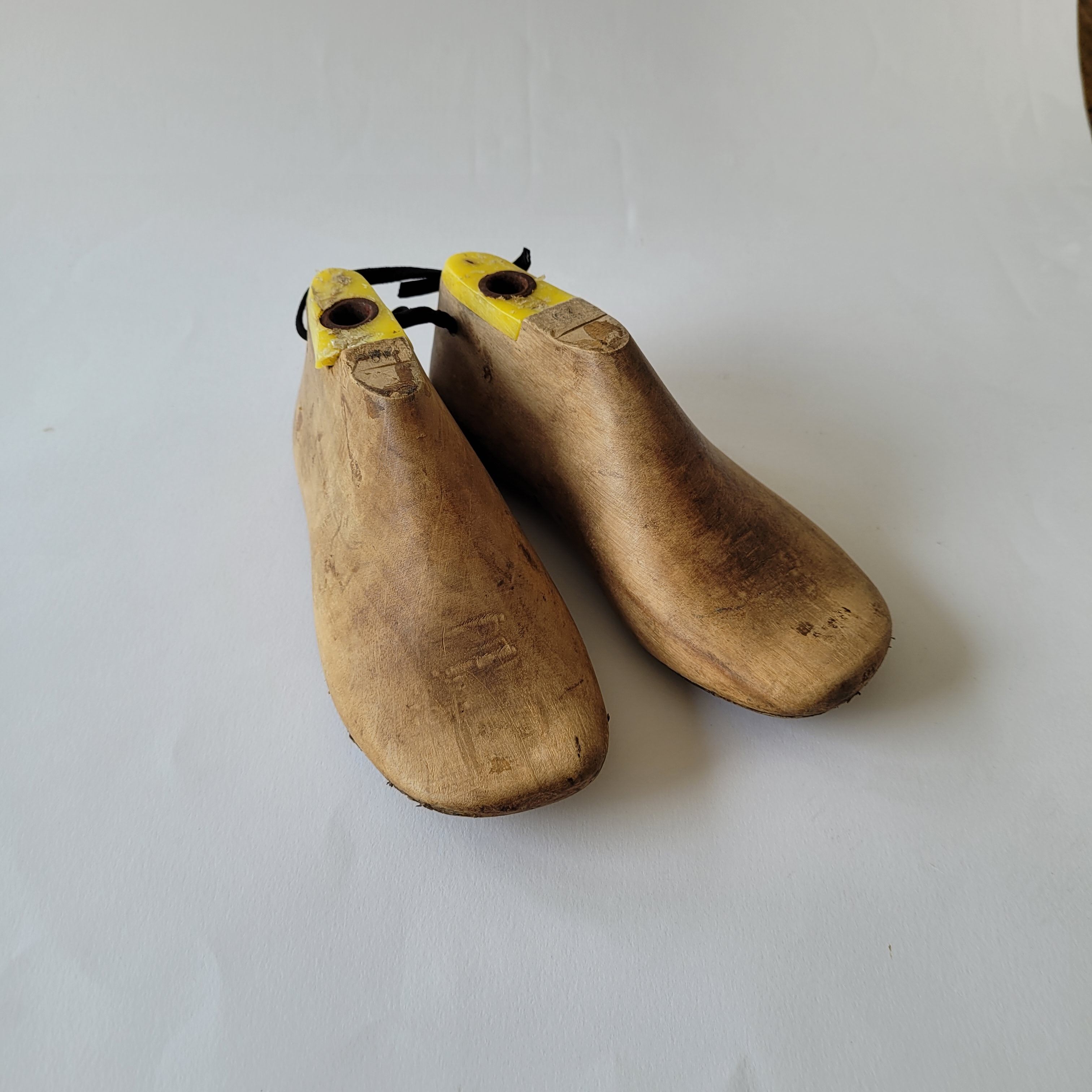 Pair of old wooden shoe shapes