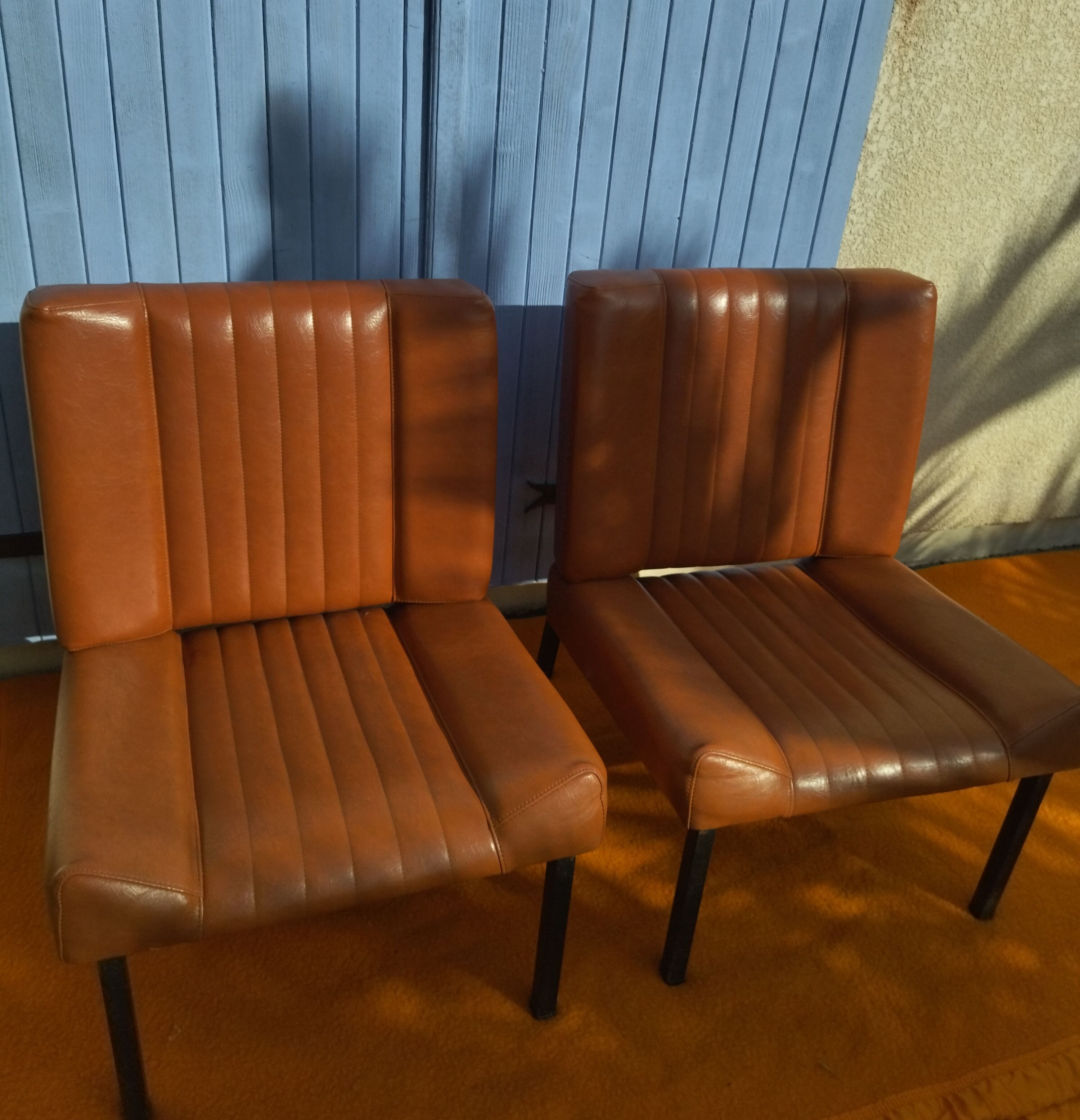 Pair of lounge armchairs, 70s leather
