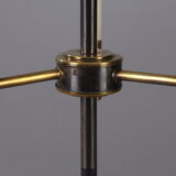Modernist table lamp in black and gold lacquered metal