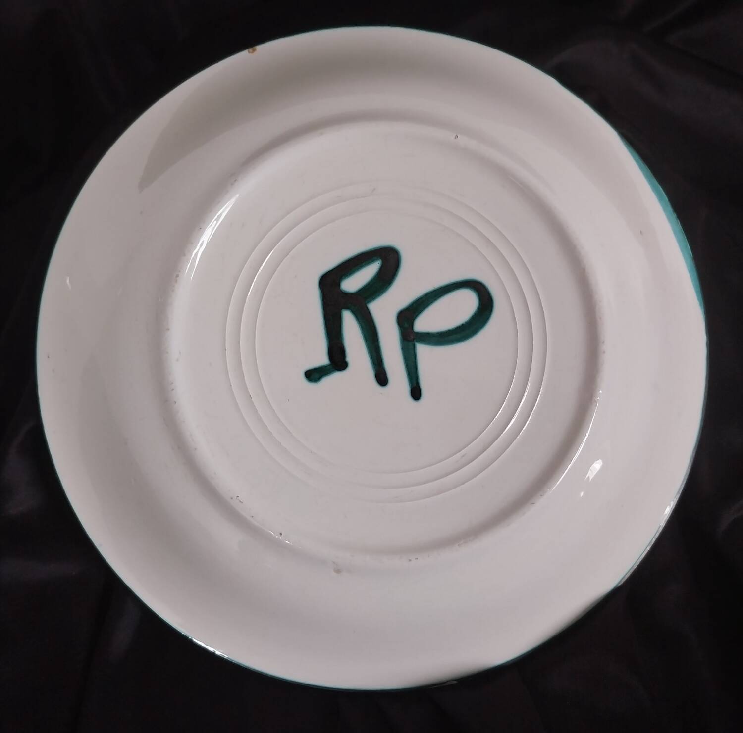 Assiette creuse à décor de poisson R.Picault