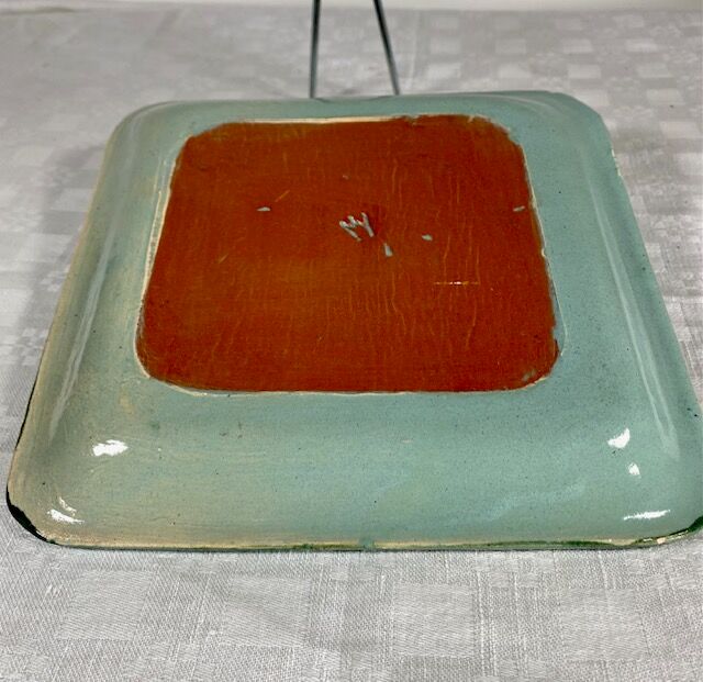 Small handmade glazed clay dish