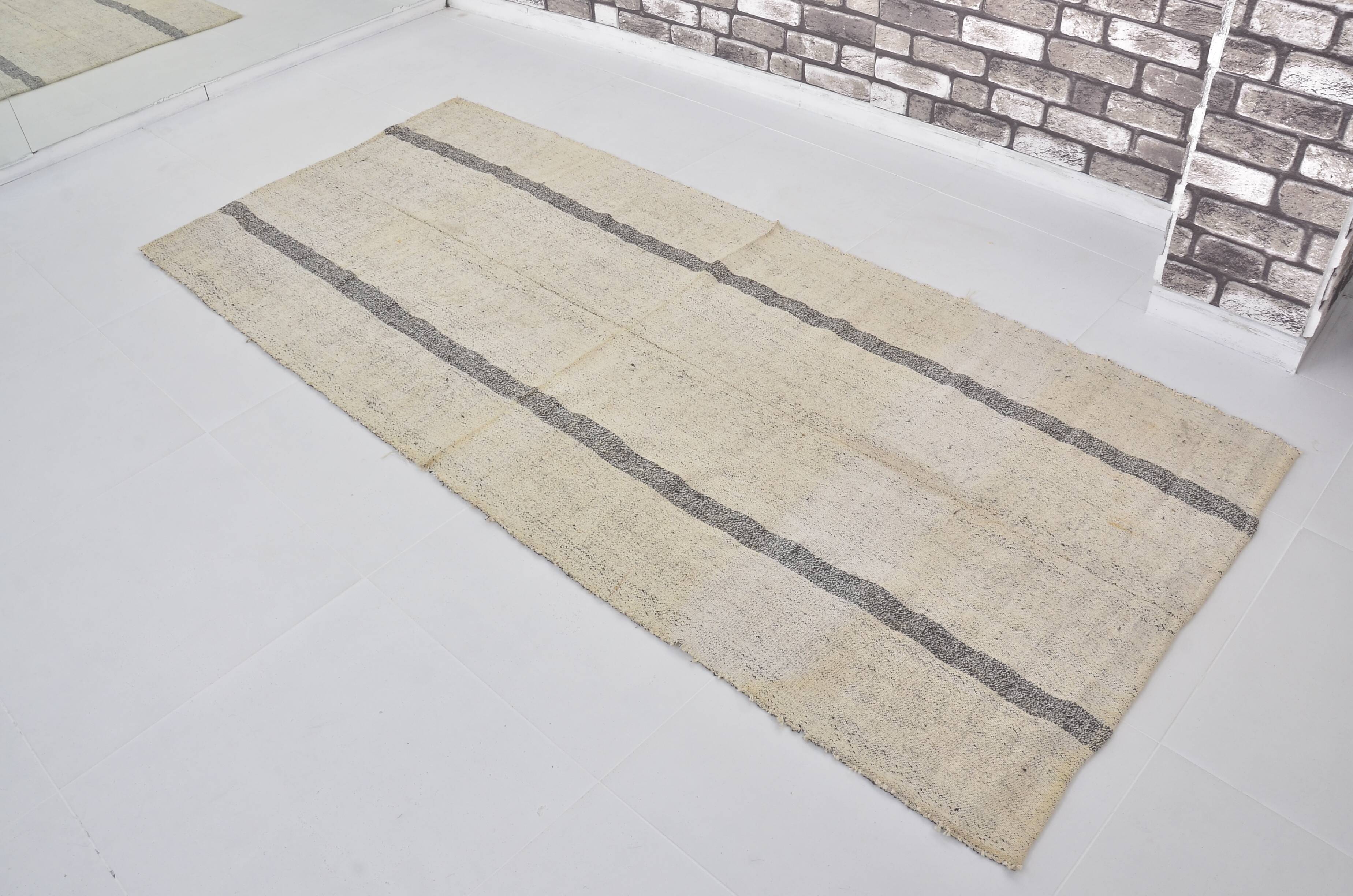 Tapis Kilim beige et noir