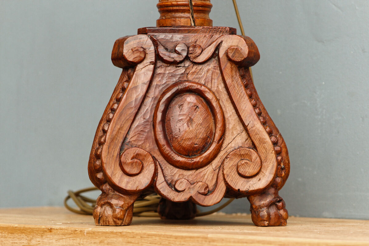 Carved wooden lamp, fiber shade
