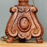 Carved wooden lamp, fiber shade