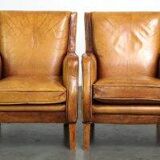 Ensemble de fauteuils en cuir couleur cognac clair de style anglais.