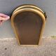 Antique brass fireplace screen from 1920, vintage spark guard.