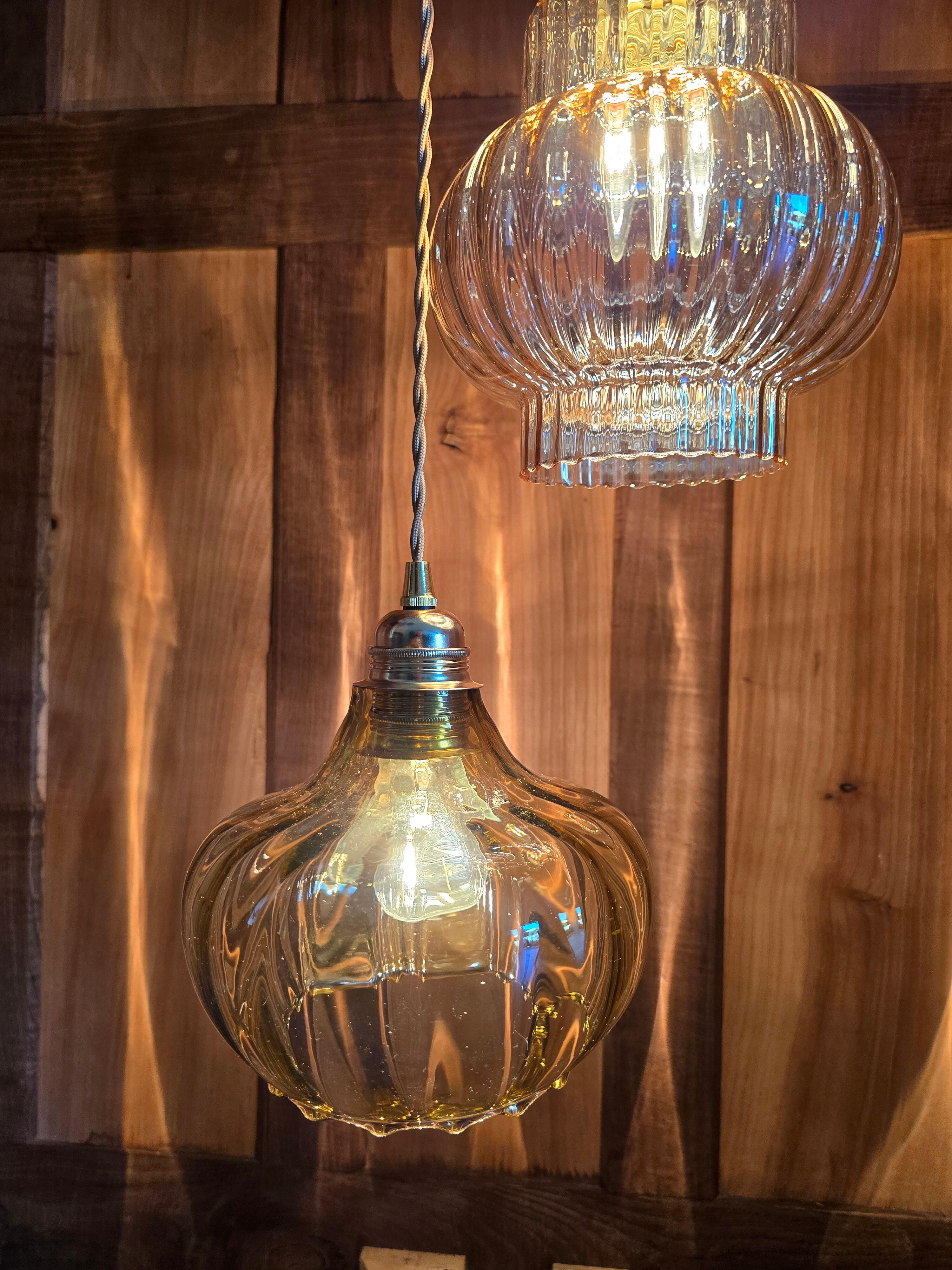 Vintage amber cascading suspension globes