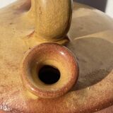Gargoulette or old jug in yellow glazed terracotta