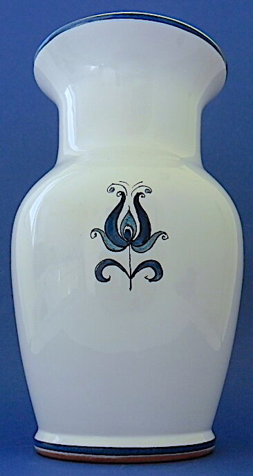 White-blue earthenware vase with stylized plant decoration