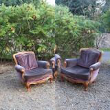 Two voltaire armchairs