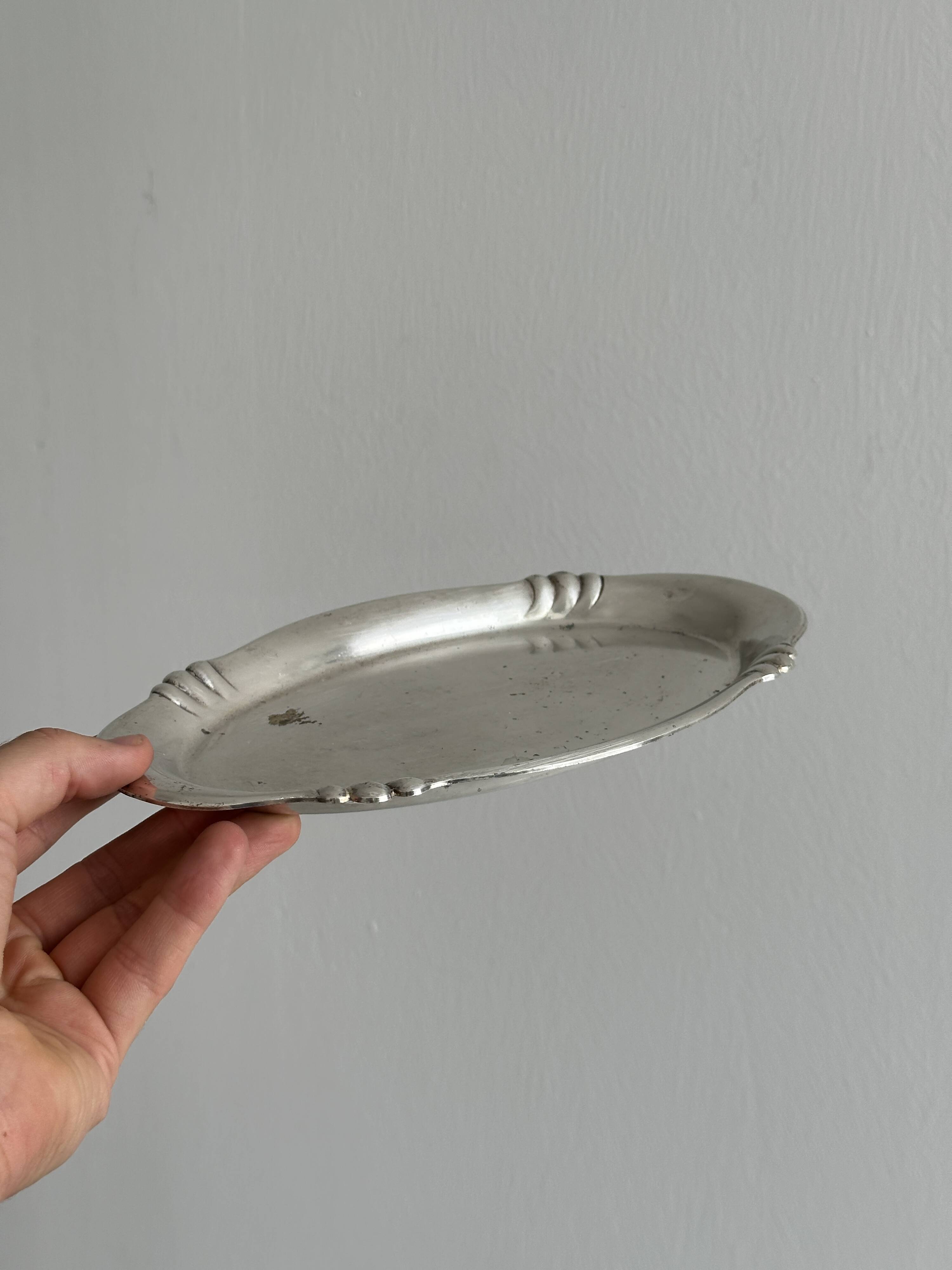 Small vintage tray in silver-plated light metal