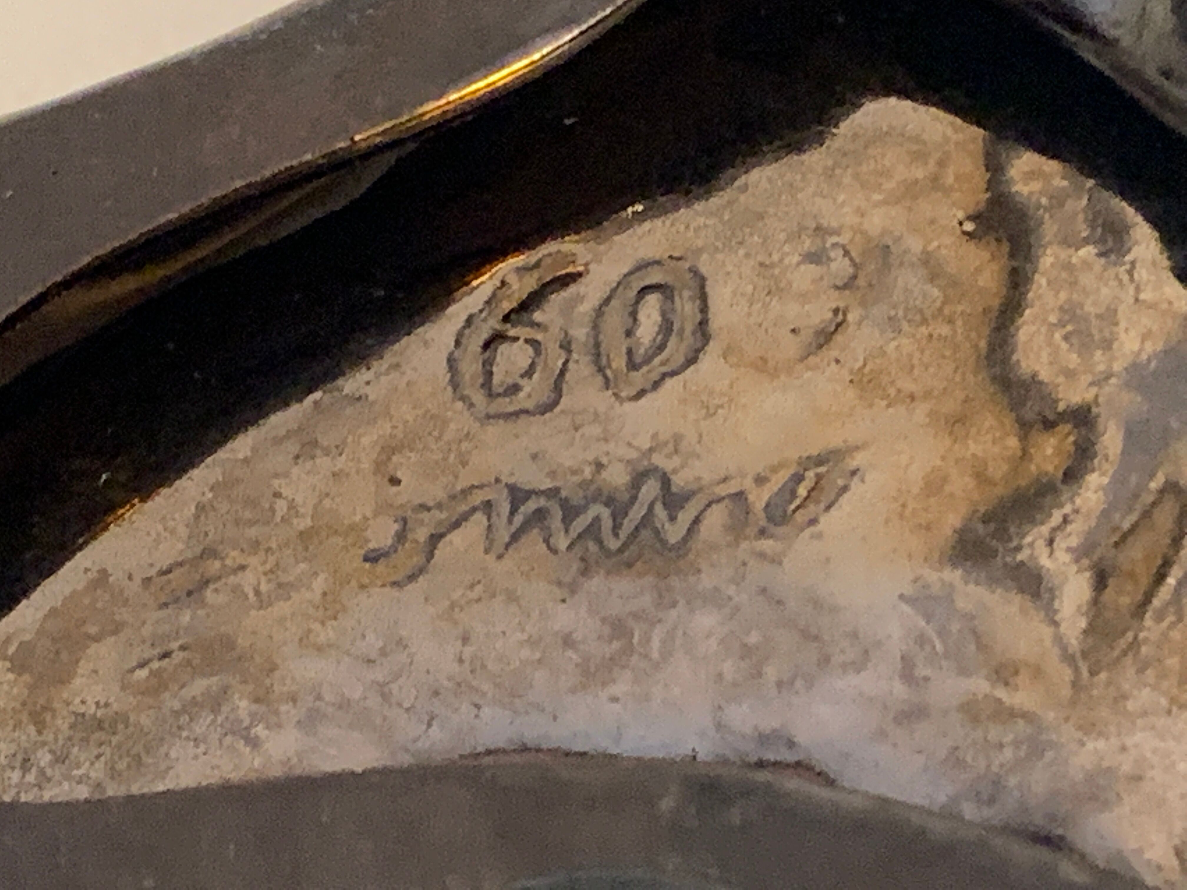 Yellow and black ceramic ashtray