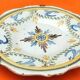 Plate (small format) polychrome earthenware XVIIIth Nevers. Wing godronnée...