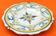 Plate (small format) polychrome earthenware XVIIIth Nevers. Wing godronnée...