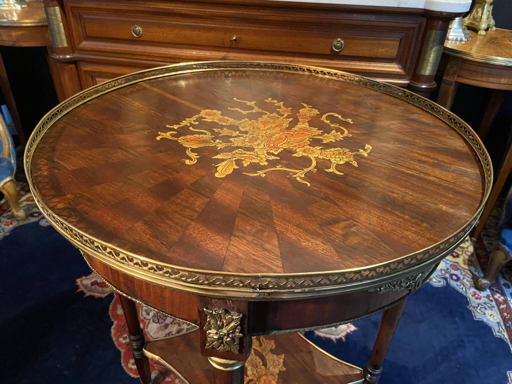 Bouillotte table pedestal table with marquetry decoration and bronze ornaments in the Louis style