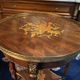 Bouillotte table pedestal table with marquetry decoration and bronze ornaments in the Louis style