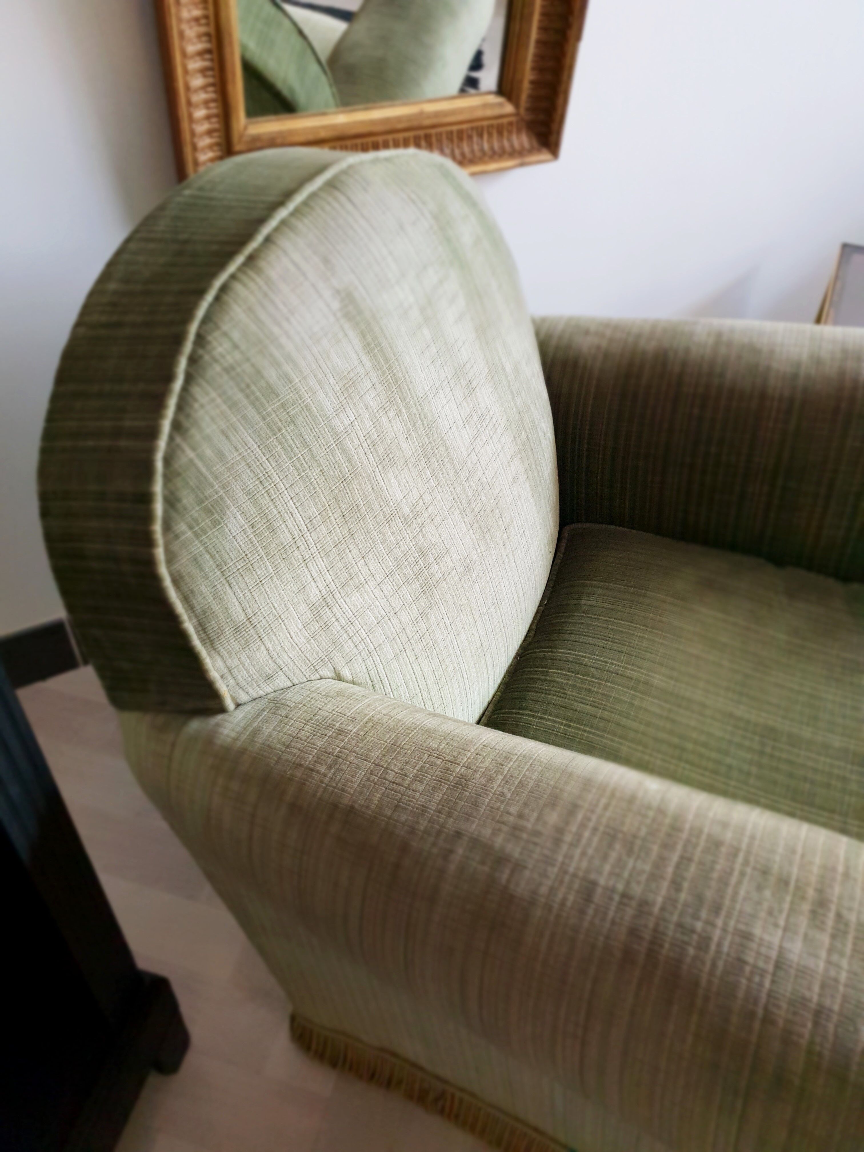 Fringed velvet armchair