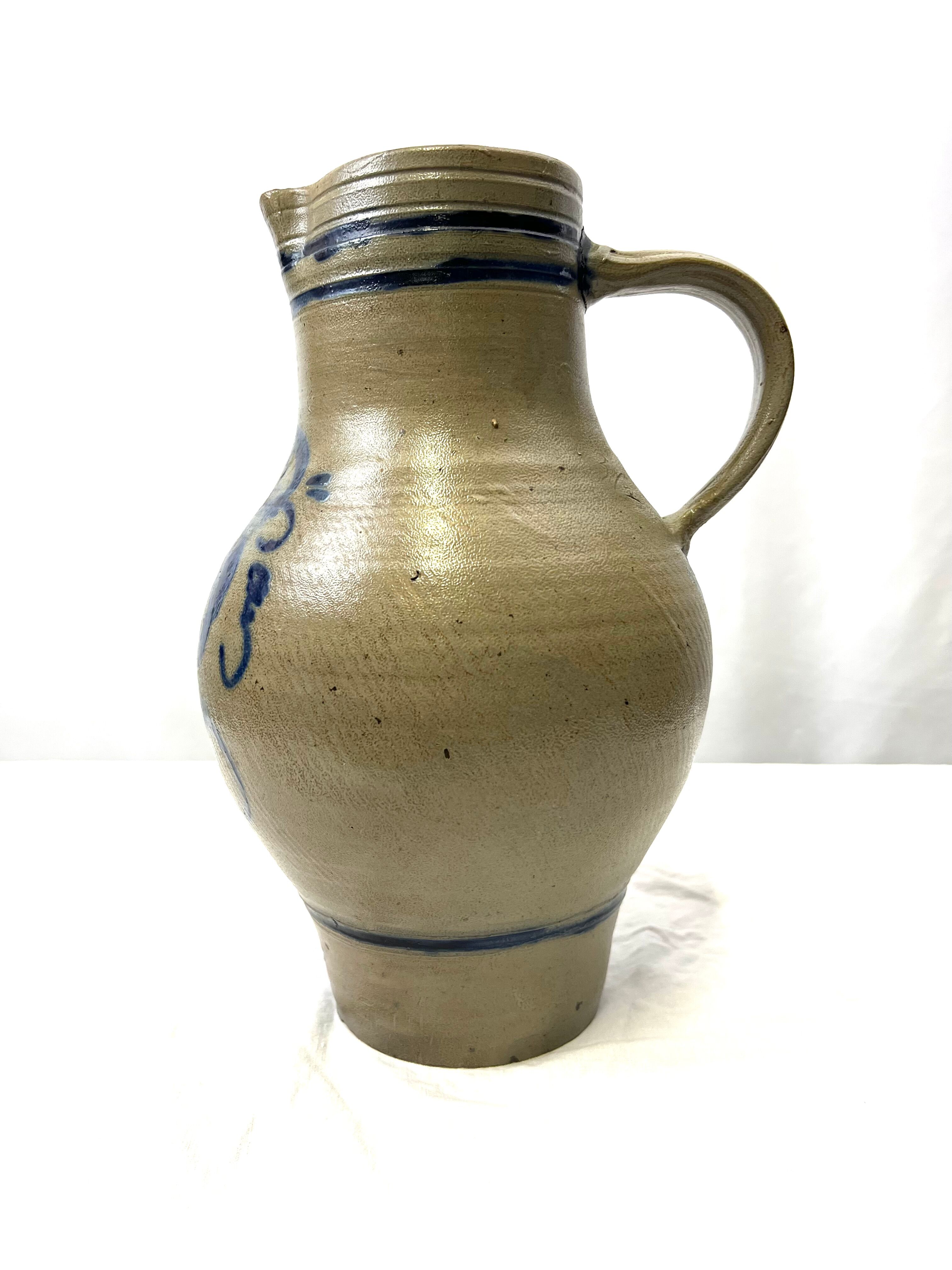 Pitcher in blue-decorated stoneware 34cm