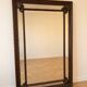 Large antique mirror in carved wood