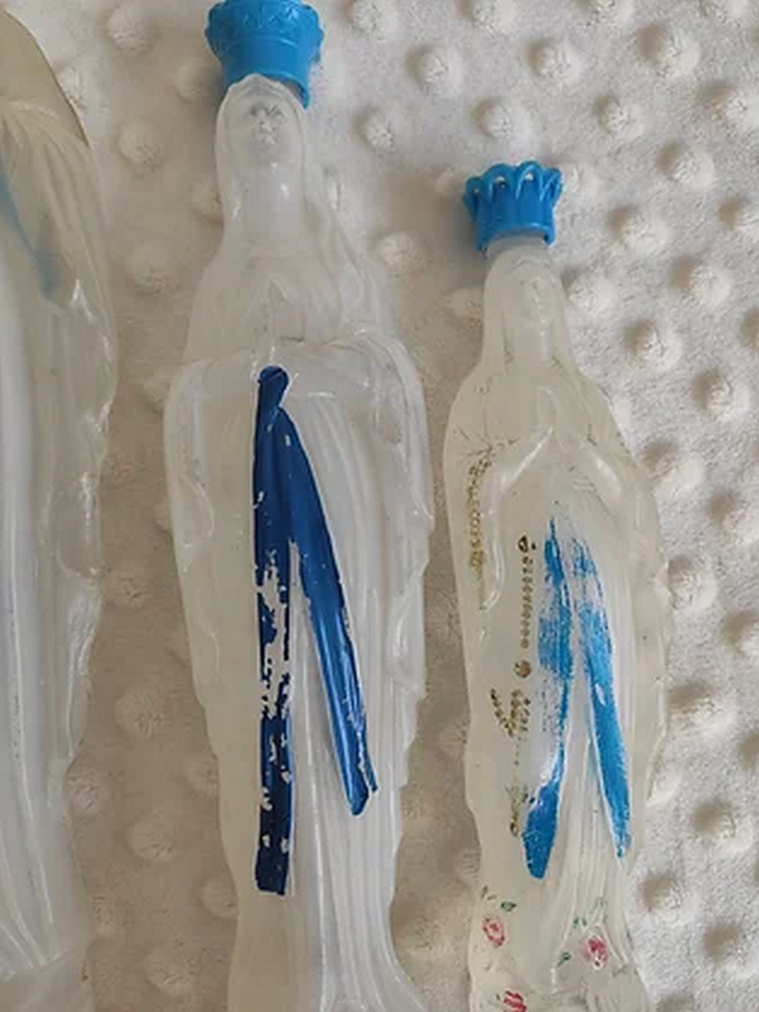 4 bottles of Lourdes