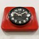 Vintage red bakelite wall clock from prim, 1970s