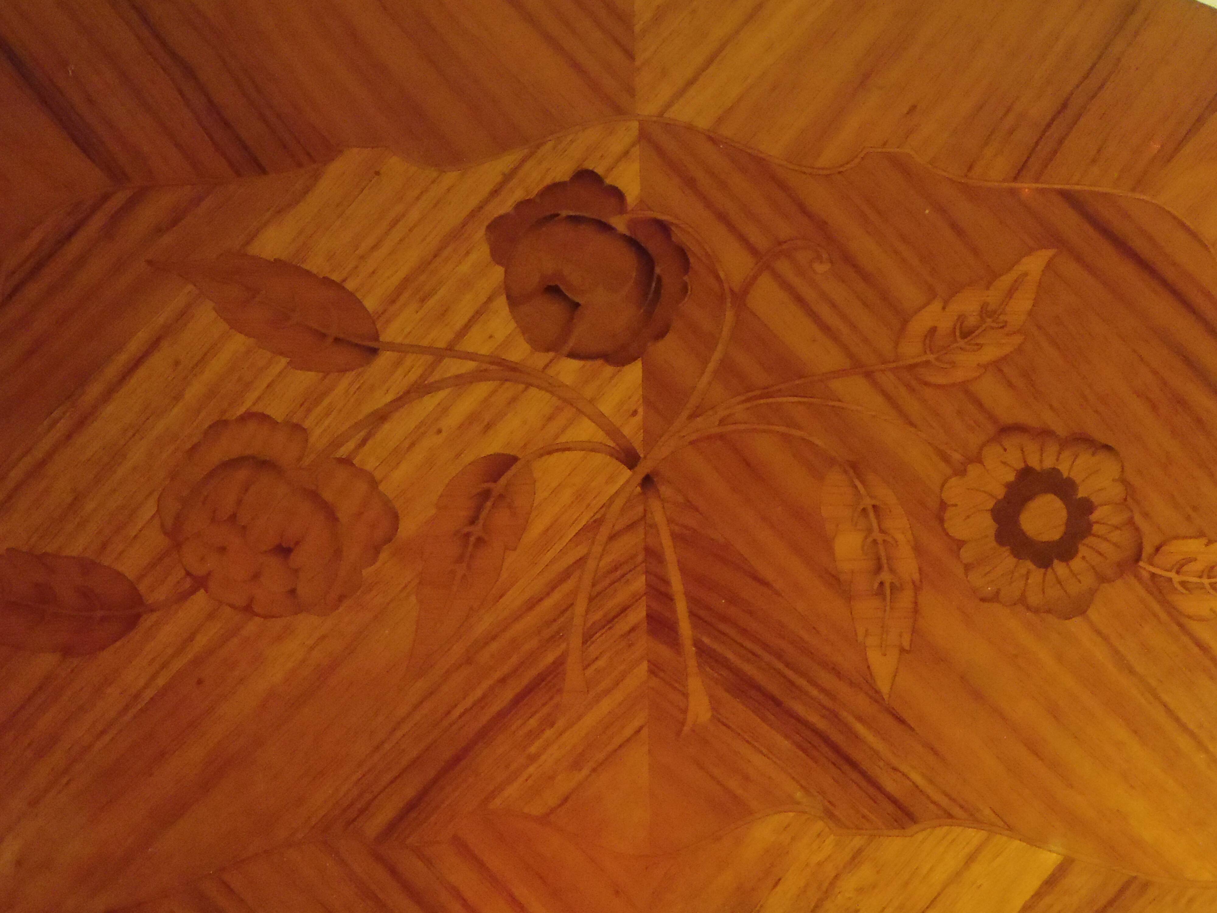 Louis XV style bedside table with varnished marquetry.