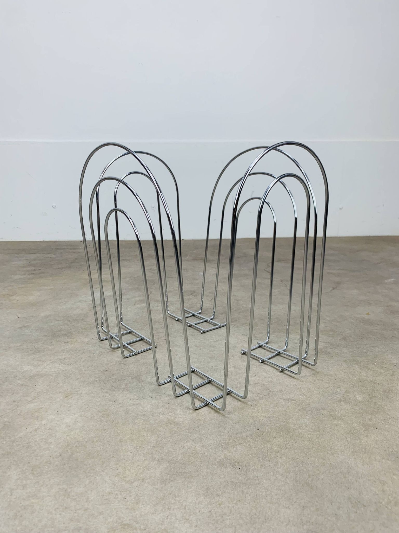 Postmodern chrome metal magazine rack from the 80s
