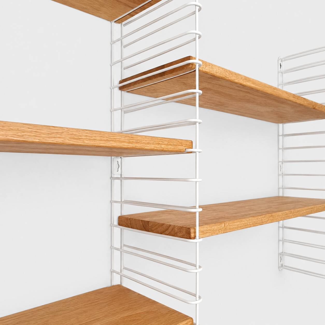 Tomado wall unit with wooden shelves by A. Dekker
