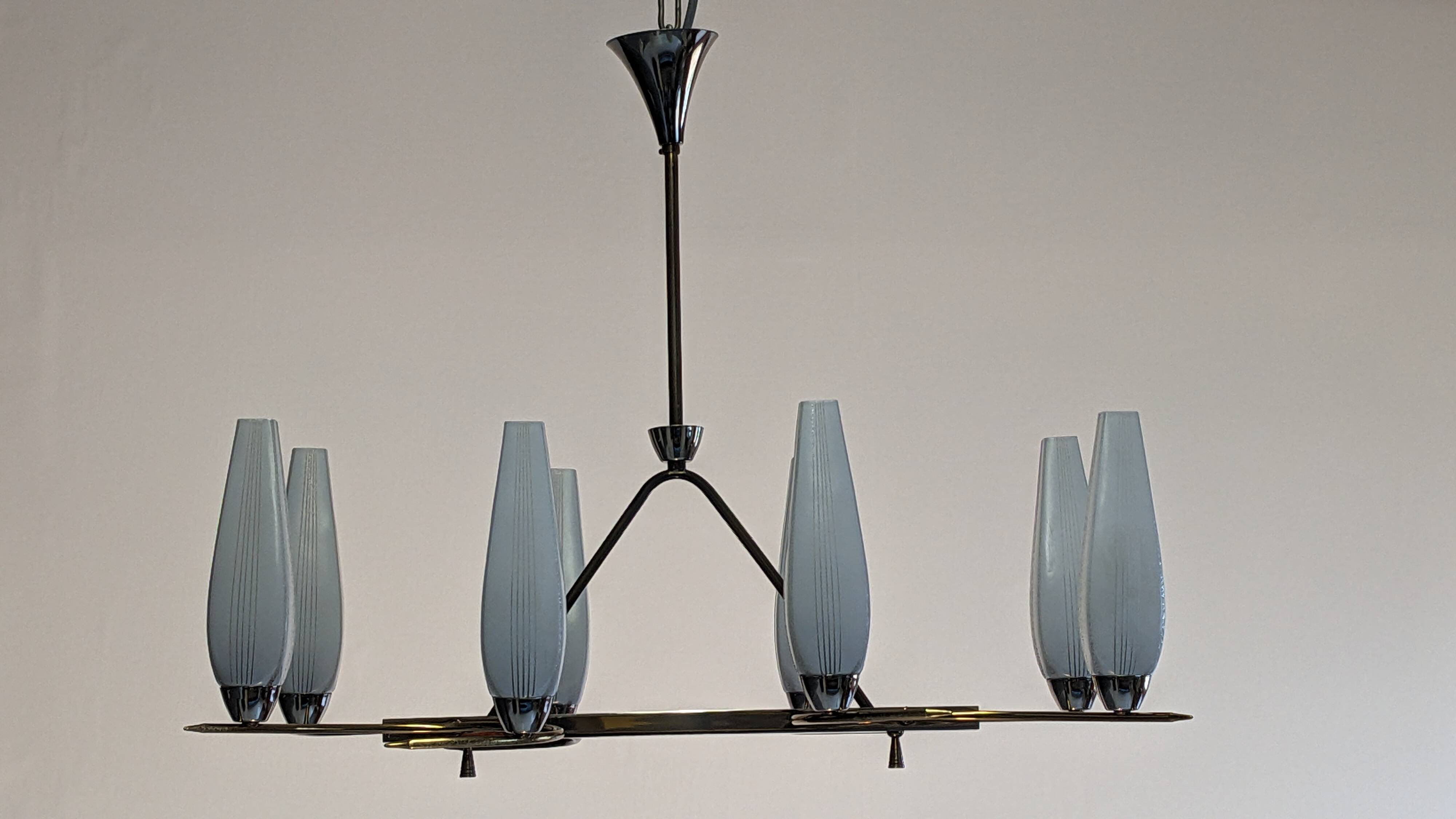 Eight-light chandelier in glass and brass, France circa 1960.