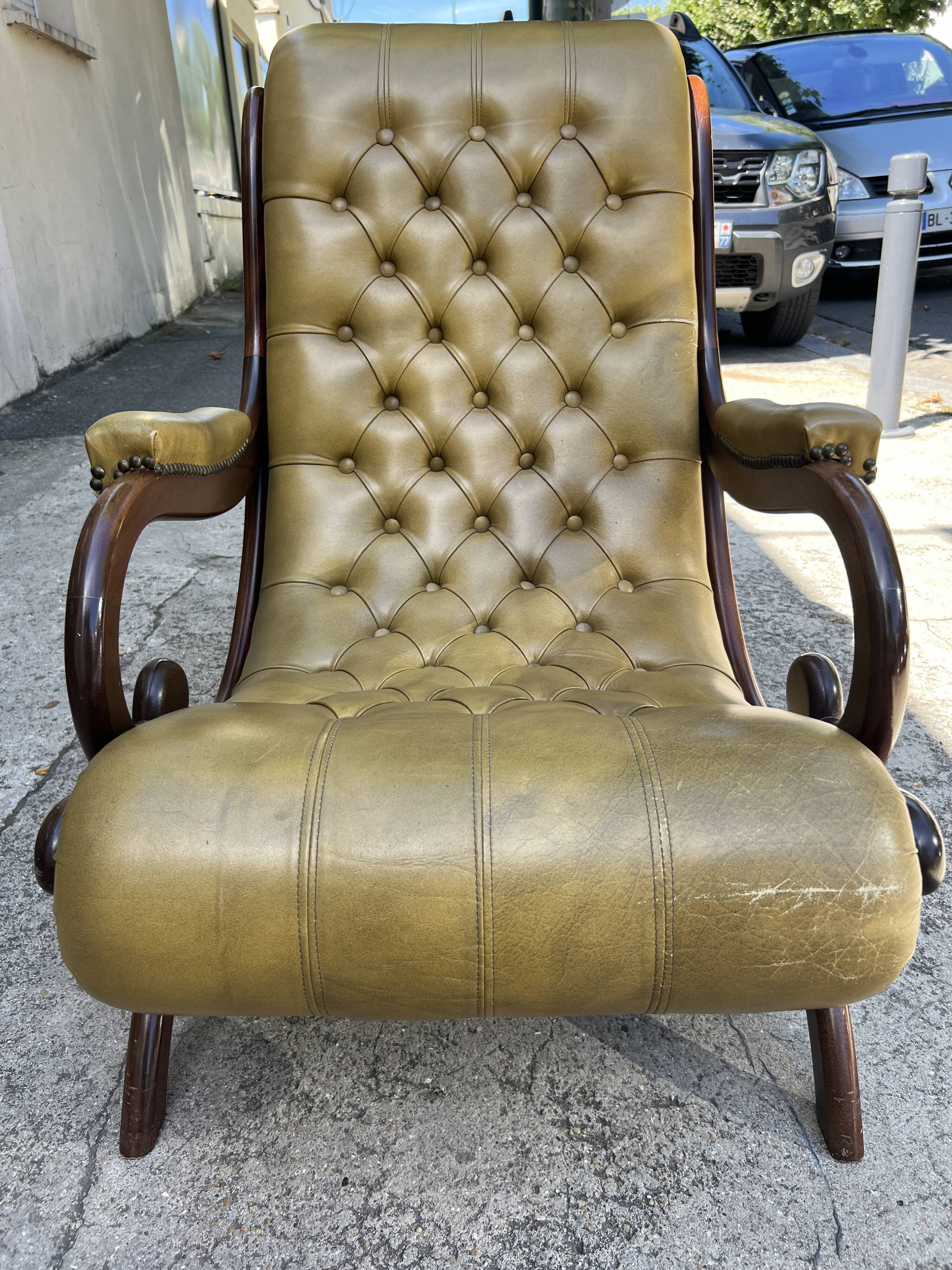 Victoria style green leather chesterfield armchair
